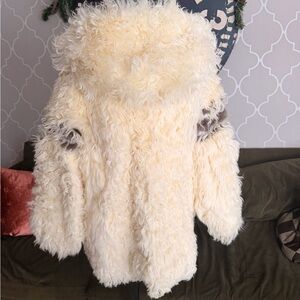 Genuine lamb fur women’s coat sized L. Oversized